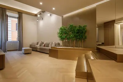 a living room with a couch and a table at Daplace - Felicia Apartment in Rome