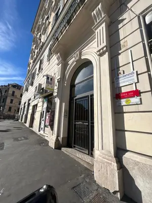 a building with a door on the side of a street at Hedi-Don sweet home-103 in Rome