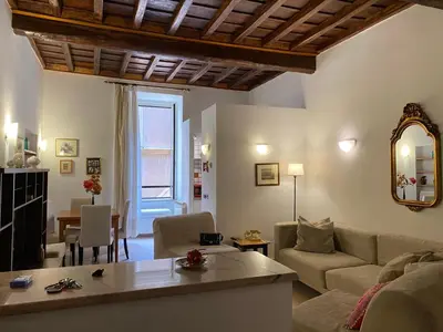 a living room with a couch and a table at Idi's House in Rome