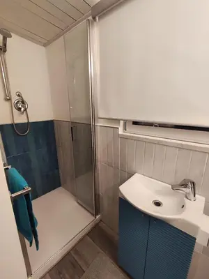 a bathroom with a shower and a sink at RomAmoR Spagna in Rome
