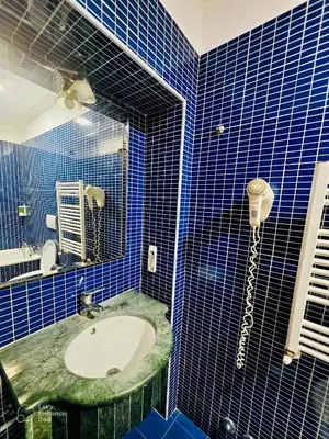 a bathroom with a toilet and a sink at Beauty Rooms in Rome