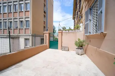 an empty alley in an apartment with buildings at Clivo 2 St Peter BuddyRent in Rome