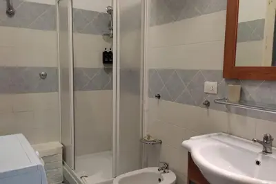 a bathroom with a shower and a sink at Gianicolo House in Rome