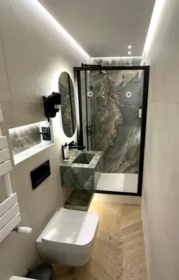 a bathroom with a shower and a toilet and a sink at Roma Luxury Stay 56 in Rome