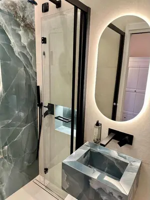 a bathroom with a sink and a mirror at Roma Luxury Stay 56 in Rome