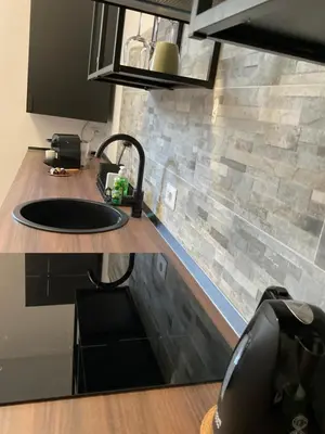 a kitchen with a sink and a counter top at CoolStayPigneto in Rome