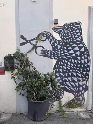 a painting of a bear on the side of a door at CoolStayPigneto in Rome