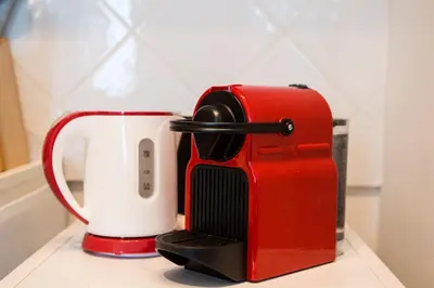 a coffee pot sitting on top of a counter at Casa Geco Cozy apartment near St Peter in Rome
