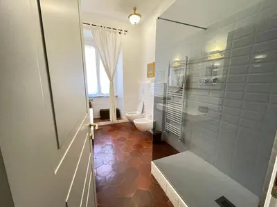 a bedroom with a bed with towels on it at Camera matrimoniale Roma Centro Vaticano in Rome