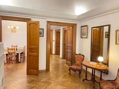 a hallway with a door leading to a living room at Camera matrimoniale Roma Centro Vaticano in Rome