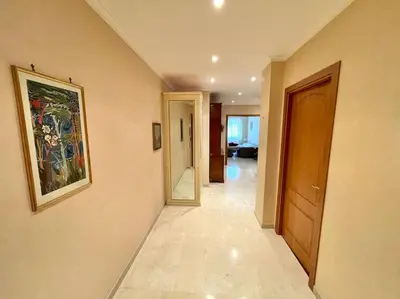 a hallway of a home with a painting on the wall at Domus St Peter in Rome