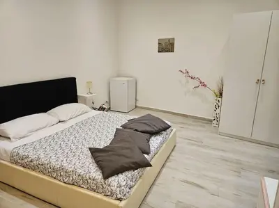 a bedroom with a bed with two pillows on it at Roma Sweet Dreams casa vacanze in Rome