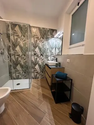 a bathroom with a shower and a sink at Civico26 in Rome