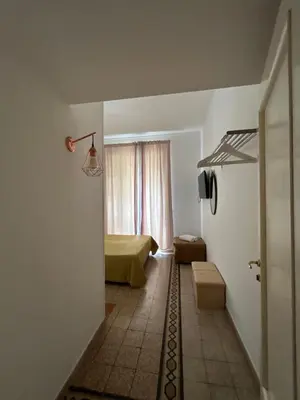 a room with a bedroom with a bed and a window at Don sweet home- Hedi 101 in Rome