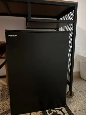 a black desk with a computer on top at Don sweet home-Hedi in Rome