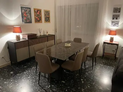 a dining room with a table and chairs at Oasi urbana - The Vatican Roof Garden in Rome