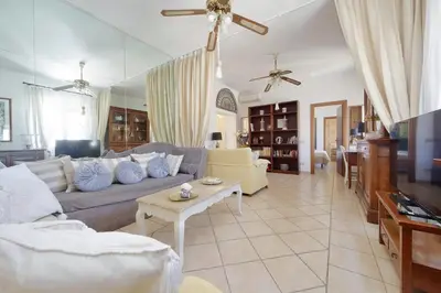 a living room with a couch and a table at Luxury Navona apartments by Flatinrome in Rome