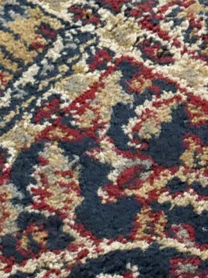 a close up of a rug with patterns on it at Intero appartamento in centro a Roma in Rome