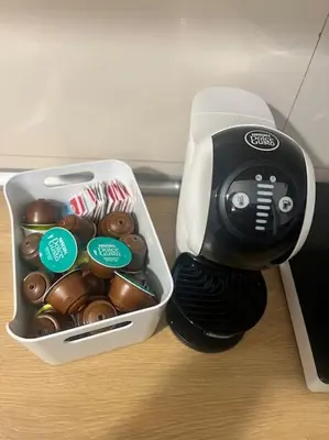 a box of donuts is next to a blender at Notte tra le stelle in Rome