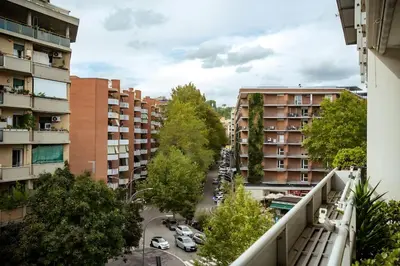 a view of a city street with buildings at 5 Min From Trastevere Rome Chic Apartment in Rome