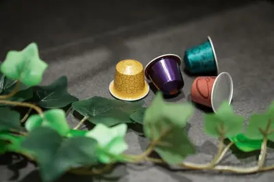 a group of miniature figurines of hats and a plant at NEW Mini Loft per 5 a Roma centro in Rome