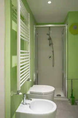 a bathroom with a shower and a toilet and a sink at NEW Mini Loft per 3 a Roma centro in Rome