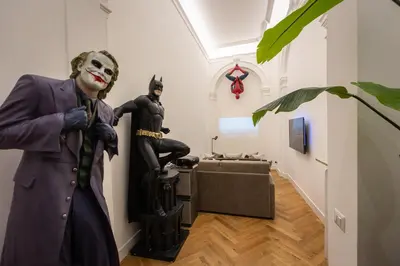 a room with a statue of a man in a suit at Amazing 3-Bedrooms Pantheon in Rome