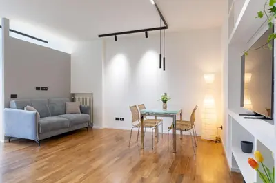 a living room with a couch and a table at Una Terrazza su San Pietro in Rome