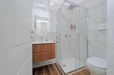 a bathroom with a shower and a toilet at Romance al Colosseo 3 in Rome