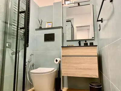 a bathroom with a toilet and a shower at A due passi dal Colosseo in Rome