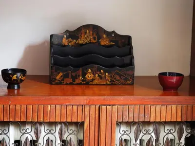 a wooden table with two bowls on top of it at Vatican Treasure Garden in Rome