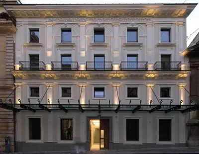 a large white building with a balcony on it at Domus Urbana 152 in Rome