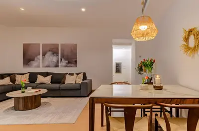 a living room with a table and a couch at Domus Urbana 152 in Rome
