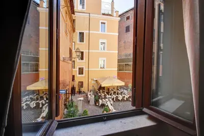 a view of a patio from a window at Coliseum cozy flat in Rome