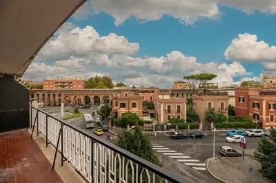 a view of a city from a balcony at Piazza Lodi - Apartment in Rome