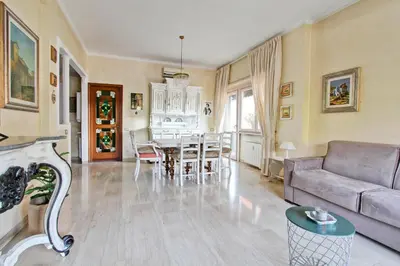 a living room with a couch and a table at Elle House in Rome