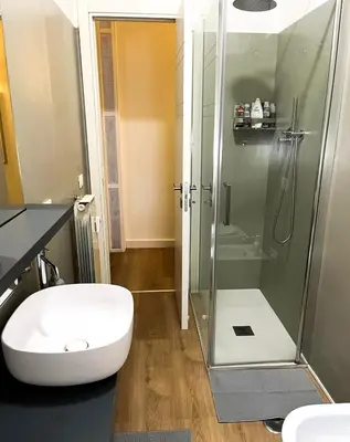 a bathroom with a shower and a toilet and a sink at Viale4Venti in Rome