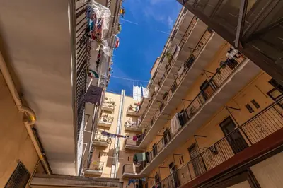a view from the inside of a building with balconies at Fresh House San Lorenzo in Rome