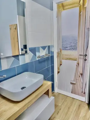 a bathroom with a white sink and a shower at Happy Days \u5feb\u4e50\u7684\u65e5\u5b50 in Rome