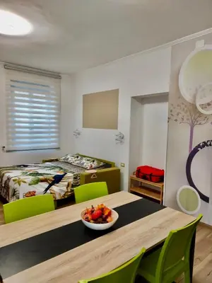 a room with a table with a bowl of fruit on it at Happy Days \u5feb\u4e50\u7684\u65e5\u5b50 in Rome