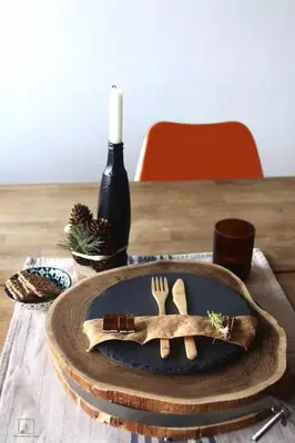 a plate with a fork and knife on a table at Rare Seed Trastevere in Rome