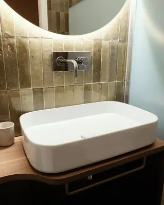 a white sink in a bathroom with a mirror at Casa Fortuna 278 in Rome
