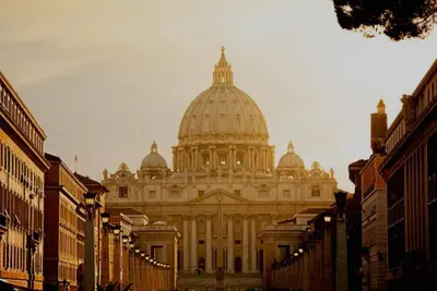 a large building with a dome on top of it at Unam Apartment Roma in Rome