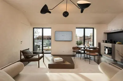 a living room with a couch and a table at master Trevi in Rome