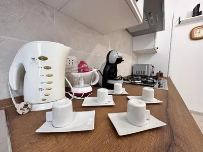 a kitchen counter with a blender on top of it at Giuli-Etta a Testaccio in Rome
