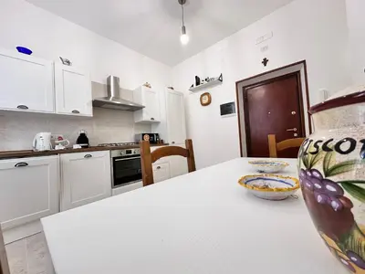 a kitchen with a table with a bowl on it at Giuli-Etta a Testaccio in Rome