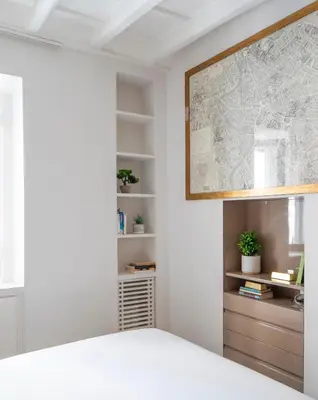 a bedroom with a map on the wall at Vittoria apartment BDB in Rome