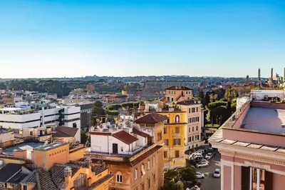 an aerial view of a city with buildings at Radice Home in Rome