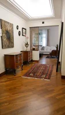 a living room with a couch and a table at Casa di Gianni in Rome