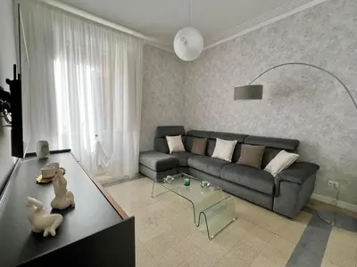 a living room with a couch and a table at Domus Dolce Vita - Apartment in Rome